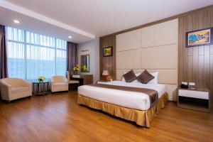 Postel nebo postele na pokoji v ubytování Muong Thanh Grand Hanoi Hotel