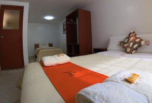 Postel nebo postele na pokoji v ubytování Sumaq Dreams Ayacucho