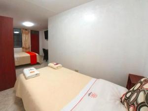 Postel nebo postele na pokoji v ubytování Sumaq Dreams Ayacucho
