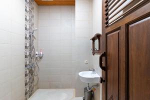a bathroom with a sink and a shower at Nature staycation Escape From City, Belgareti Farm in Nangkabeurit +32 photos
