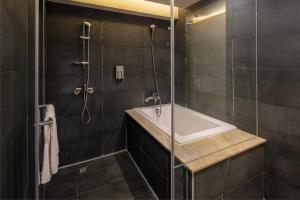 Ein Badezimmer in der Unterkunft Goodmore Hotel