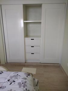 Postel nebo postele na pokoji v ubytování Cabrera Family Villa