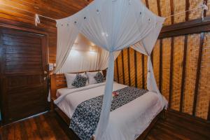 Postel nebo postele na pokoji v ubytování Dream Beach Huts