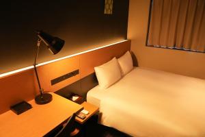 Postelja oz. postelje v sobi nastanitve N Plus Hotel Akihabara