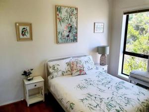 Ένα ή περισσότερα κρεβάτια σε δωμάτιο στο Maggie's Place Too