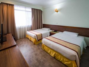 Postel nebo postele na pokoji v ubytování Miri Hotel + 37 fotografií