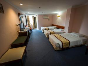 TV a/nebo společenská místnost v ubytování Miri Hotel