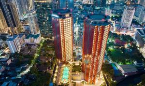 an overhead view of a city at night at Chatrium Grand Bangkok in Bangkok