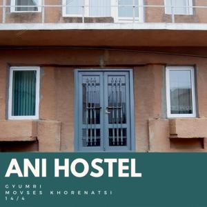 a sign that reads an hospital in front of a building at Ani Hostel Gyumri in Gyumri
