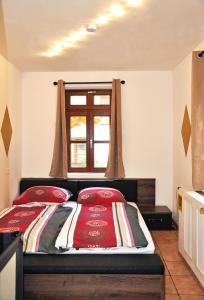 Postel nebo postele na pokoji v ubytování Ferienwohnung Mörlenbach Altstadt