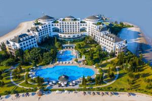 an aerial view of a resort with a large pool at Vinpearl Resort & Spa Ha Long in Ha Long