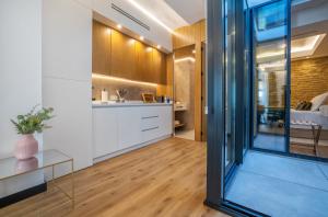 Kuchyňa alebo kuchynka v ubytovaní Olivia Suites Apartments