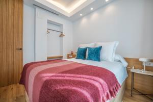Posteľ alebo postele v izbe v ubytovaní Olivia Suites Apartments