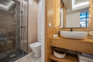 Kúpeľňa v ubytovaní Olivia Suites Apartments