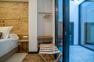 Posteľ alebo postele v izbe v ubytovaní Olivia Suites Apartments