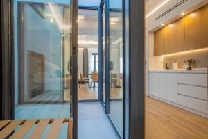 Kuchyňa alebo kuchynka v ubytovaní Olivia Suites Apartments
