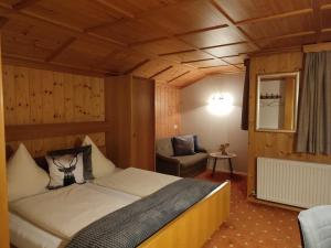 Posteľ alebo postele v izbe v ubytovaní Alpenblühn Appartements Tschagguns