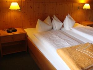 Posteľ alebo postele v izbe v ubytovaní Hotel Garni Schieferle