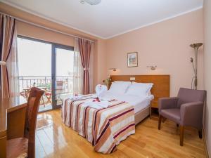 Postel nebo postele na pokoji v ubytování Hotel Petrovac