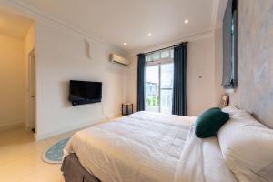 Postel nebo postele na pokoji v ubytování Romatic Venice Homestay
