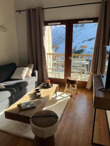 Posedenie v ubytovaní La Mongie magnifique Appart 7 pers vue pistes, piscine, wifi, salle de sport