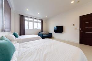 Postel nebo postele na pokoji v ubytování Romatic Venice Homestay