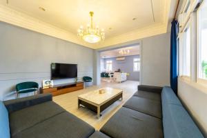 TV a/nebo společenská místnost v ubytování Romatic Venice Homestay