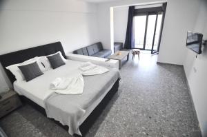 Posteľ alebo postele v izbe v ubytovaní Zennova Sirene Luxury Studios