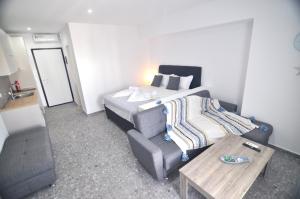 Posteľ alebo postele v izbe v ubytovaní Zennova Sirene Luxury Studios