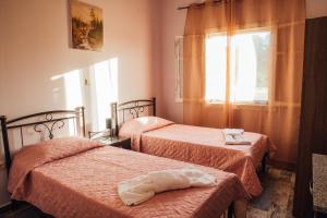 A bed or beds in a room at Villa Christa