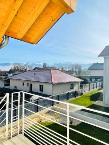 a view from the balcony of a house at Studio ideal deplacement pro tourisme et mariage Parking gratuit in Chapareillan