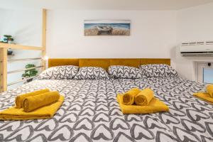 Ένα ή περισσότερα κρεβάτια σε δωμάτιο στο Studio Apartment LION Portorose