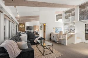 a living room with a couch and a table at Standard Three Bedroom - Aspen Alps #406 in Aspen