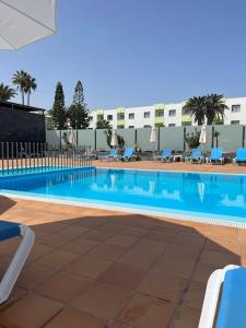 Swimmingpoolen hos eller tæt på Corralejo Apartment