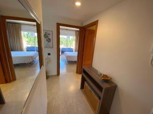 Posteľ alebo postele v izbe v ubytovaní Golden Beach 205