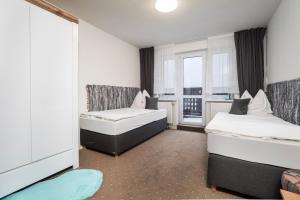 A bed or beds in a room at Ubytovanie u Maťka a Kubka