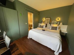 Postel nebo postele na pokoji v ubytování Hotel Montanus