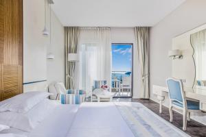 Postel nebo postele na pokoji v ubytování Hotel Bracera