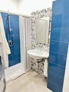 A bathroom at Notti Magiche Még 18 kép