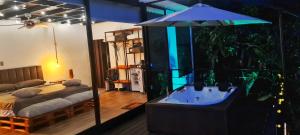 Postel nebo postele na pokoji v ubytování Oasis Glamping Tena Cun Vía La Mesa Anapoima