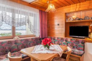 TV a/nebo společenská místnost v ubytování Gästehaus Gisela 2