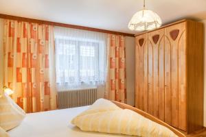 Postel nebo postele na pokoji v ubytování Gästehaus Gisela 2