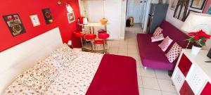 Postel nebo postele na pokoji v ubytování Cozy Studio Las Americas