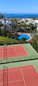 Tenis a/nebo squash v ubytování Cozy Studio Las Americas nebo okolí