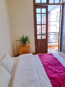 Postel nebo postele na pokoji v ubytování Homestay VICTORY