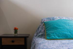 Voodi või voodid majutusasutuse Apart Hotel Colors toas