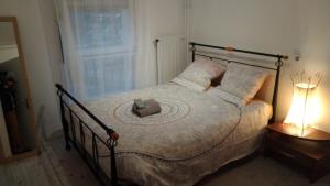 Postel nebo postele na pokoji v ubytování Chez Bernadette