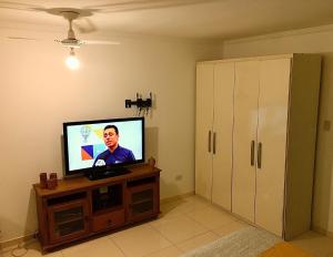 TV a/nebo společenská místnost v ubytování Cantinho da Bruxa