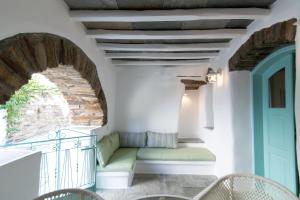 A seating area at Galatea House Katoï with patio