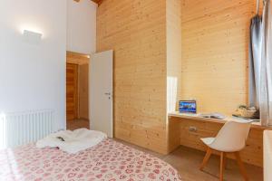 Postel nebo postele na pokoji v ubytování Baita sulle piste in Valmalenco